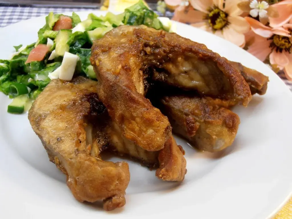 Warum österreichische Hausfrauen Orangenschalen nach dem Fischbraten nie wegwerfen