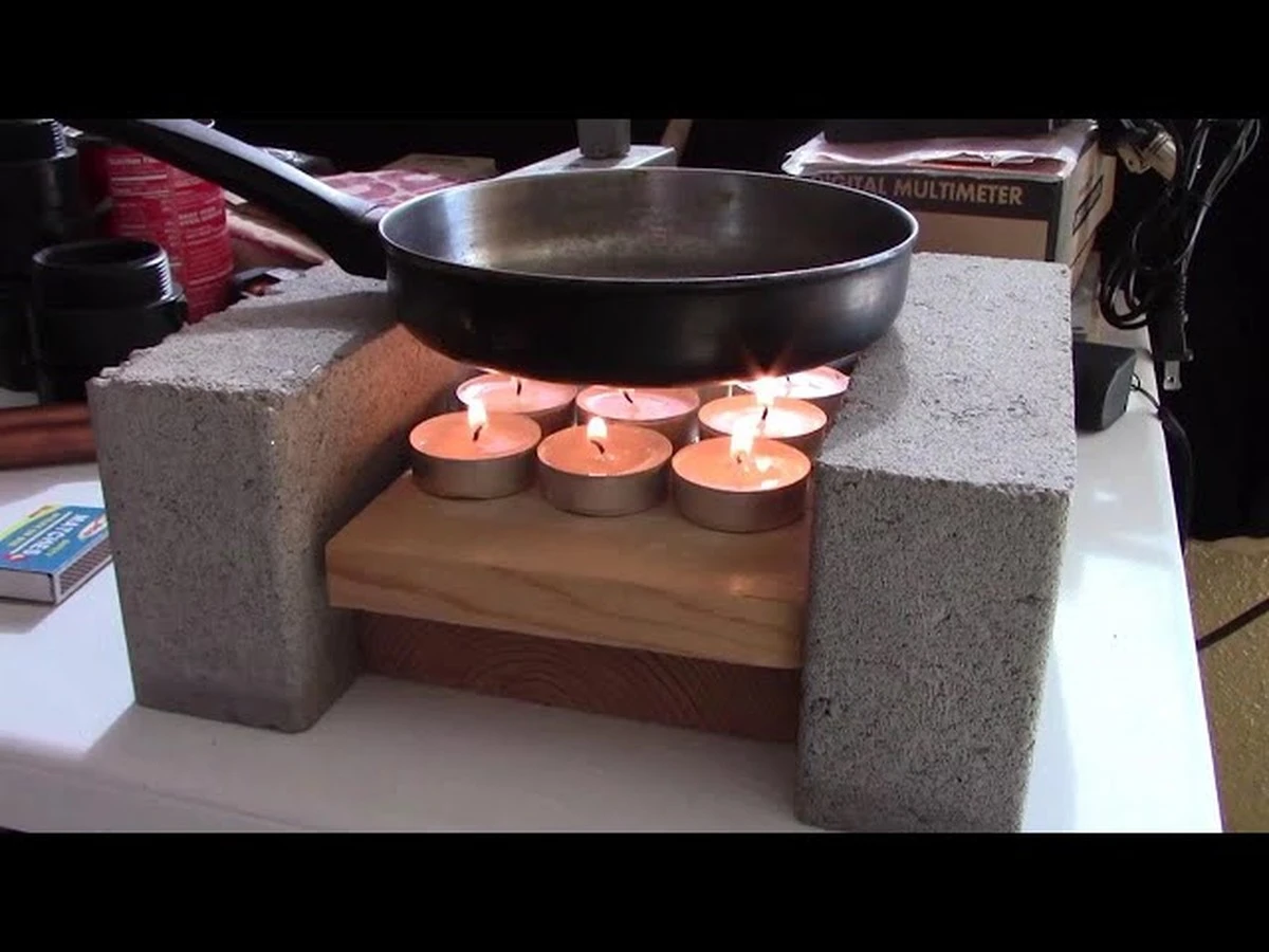 Die alte Löchel-Pfanne: So wird sie zur Kerzen-Heizung für warmes Essen - image 1